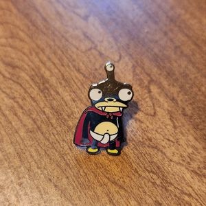 Nibbler enamel pin
